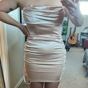 Rose gold oh Polly mini dress.